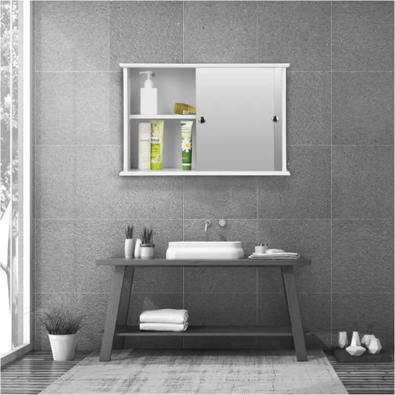 BukkitBow badkamermeubel met spiegel, verstelbare plank, schuifdeur en waterbestendige afwerking, maat 55x14x36 cm.
