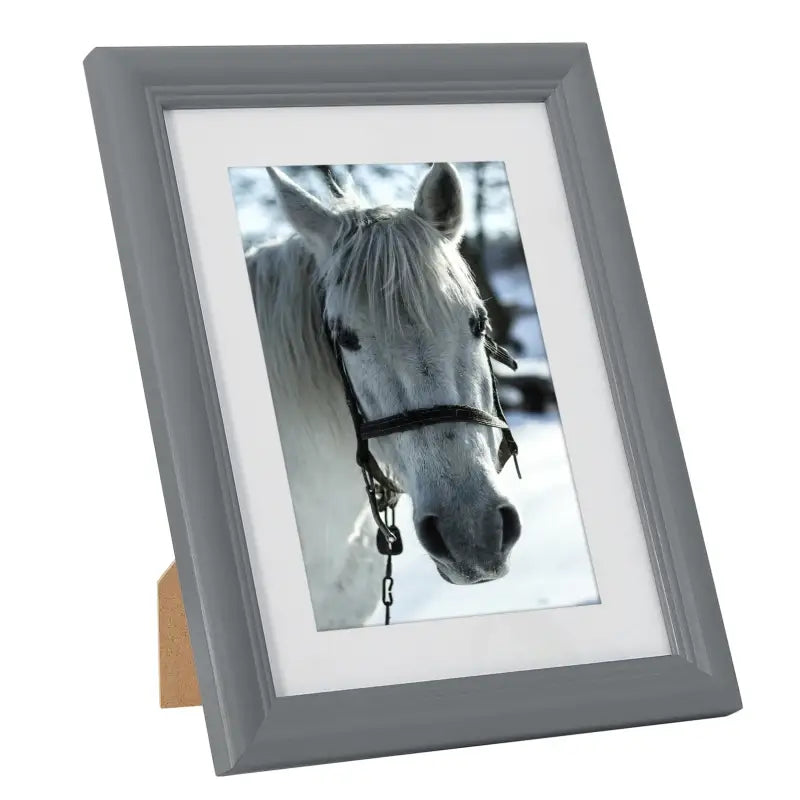 Massieve houten fotolijst van BukkitBow met glasbescherming, modern ontwerp en diverse maten, geschikt voor stijlvolle foto’s.