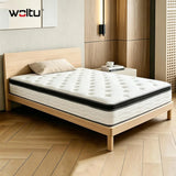 Wit pocketvering matras 90x200 op een houten eenpersoonsbed, met gewatteerde bovenkant