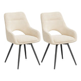 Twee beige draaibare eetkamerstoelen met gebogen armleuningen en zwarte metalen poten