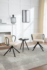 Twee draaibare velvet eetkamerstoelen van BukkitBow met armleuningen, elegant en comfortabel in een modern interieur.