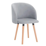 BukkitBow fluwelen eetkamerstoel met massief houten frame, ergonomisch ontwerp en zithoogte van 47 cm.