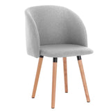 BukkitBow linnen eetkamerstoel met massief houten frame, ergonomisch design en zithoogte van 47 cm.