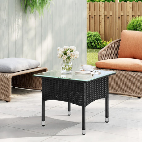 BukkitBow luxe polyrattan bijzettafel met gehard glazen blad, weerbestendig en geschikt voor buiten.