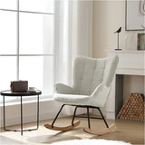 Luxe BukkitBow relaxstoel met moderne wingvorm, zachte ribfluwelen bekleding en metalen poten, zithoogte 46 cm.