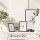 Massieve houten fotolijst van BukkitBow met glasbescherming, modern design en diverse maten, geschikt voor foto’s en kunstwerken.