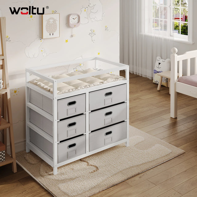 Moderne BukkitBow commode met 6 laden, wit en grijs, inclusief aankleedblad en stijlvolle opbergoplossing.