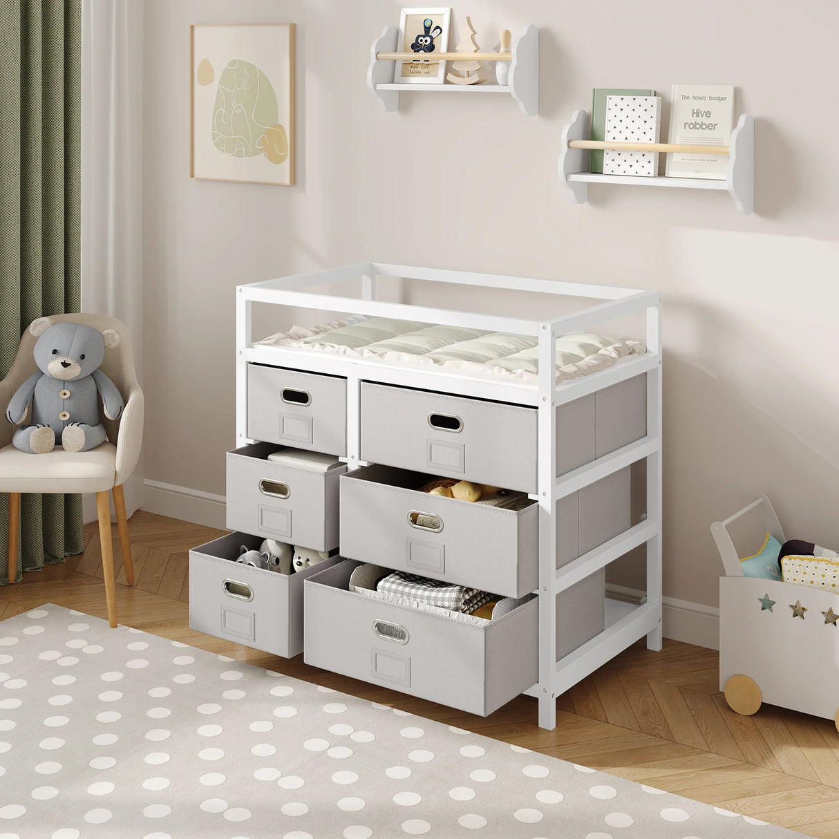 Moderne BukkitBow commode met 6 laden, wit en grijs, inclusief aankleedblad, geschikt voor elegante slaapkamers.