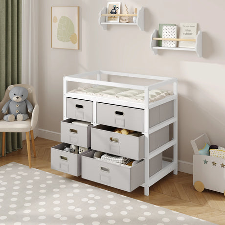 Moderne BukkitBow commode met 6 laden, wit en grijs, inclusief aankleedblad, geschikt voor elegante slaapkamers.