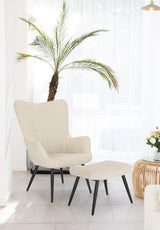 Moderne BukkitBow corduroy fauteuil met voetenbank in retro ontwerp, comfortabel zitmeubel met stijlvolle uitstraling.