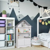 Moderne kinderboekenkast van BukkitBow met stervormig design en kastdeurtje, geschikt voor kinderkamers.