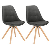 Stijlvolle BukkitBow eetkamerstoel met fluwelen bekleding, ergonomisch zitcomfort en zithoogte van 46 cm.