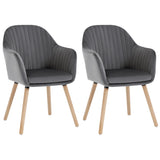 Set van 2 BukkitBow eetkamerstoelen met fluwelen bekleding, armleuningen en houten poten, gestoffeerd voor comfort.
