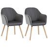 Set van 2 BukkitBow eetkamerstoelen met fluwelen bekleding, armleuningen en houten poten, gestoffeerd voor comfort.