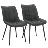 Set van 2 BukkitBow eetkamerstoelen met leren, stoffen en fluwelen bekleding, metalen poten en ergonomisch ontwerp.