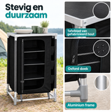 Zwarte campingkast van BukkitBow met tafelblad, aluminium frame en drie opbergvakken, geschikt voor outdoor gebruik