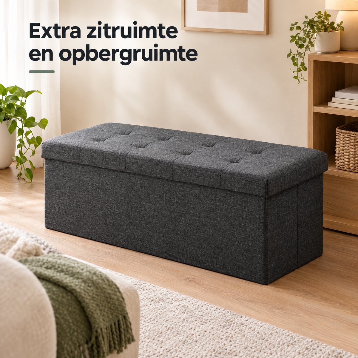 Opvouwbare opbergbank van BukkitBow, 110 cm, 118 liter, belastbaar tot 300 kg, in een woonkamer met lifestylegebruik.