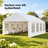 witte partytent met zijwanden in gebruik in een passende praktijksituatie